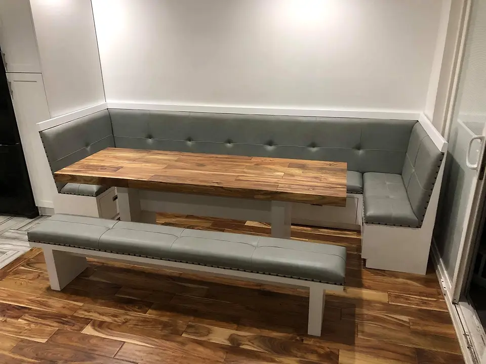 Custom banquette with dining table by Jupiter Cabinets