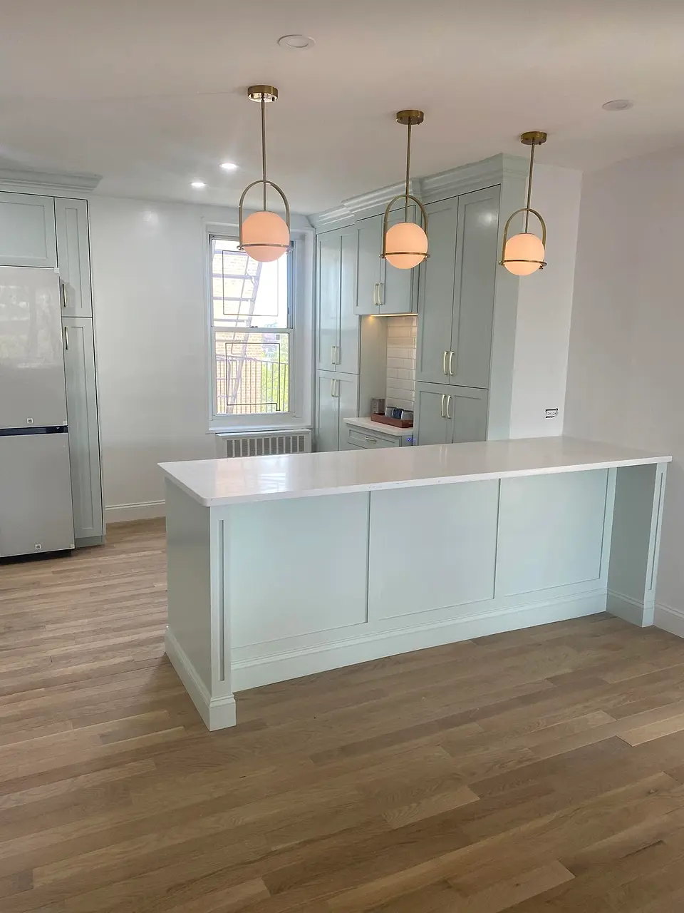 Sage shaker kitchen with island
