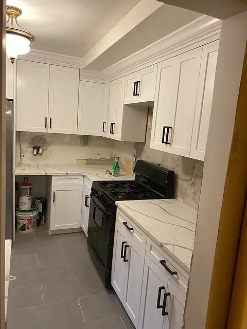 White kitchen with gray tile
